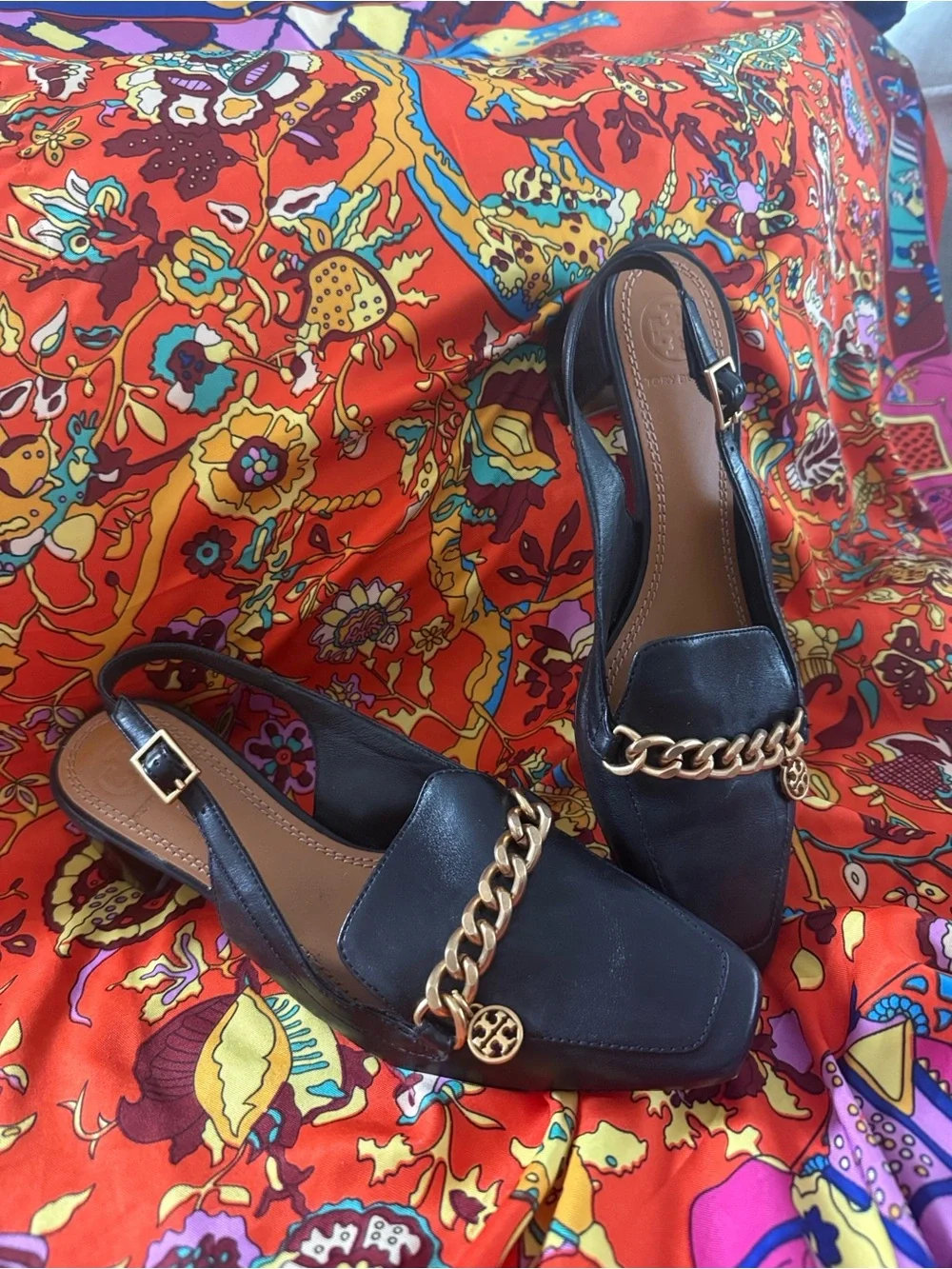 Tory Burch Black Leather Slingback Mules with Gold Chain Accent